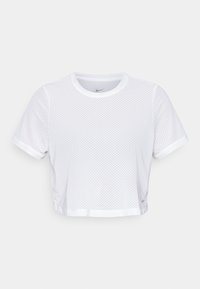 Top corto de malla blanca con mangas cortas, cuello redondo y logo de Nike. Presenta una textura transpirable y un ajuste holgado y relajado.