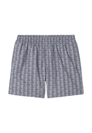 Shorts a vita elastica grigio chiaro con motivo ricorrente di torri geometriche scure e vestibilità ampia.