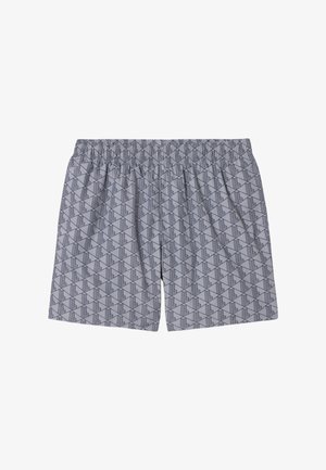 Shorts a vita elastica grigio chiaro con motivo ricorrente di torri geometriche scure e vestibilità ampia.