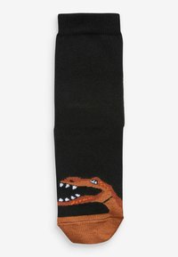 Schwarze Socke mit einem Dinosaurier-Graphic in Orange im unteren Bereich; gerippte Textur; mittellange Socken bis zur Wade; runde Zehenform.