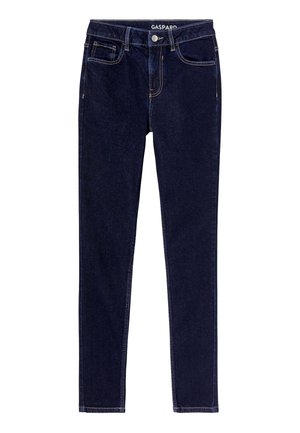 Jean bleu foncé à coupe slim, fabriqué en denim. Comprend cinq poches, des coutures contrastées et une taille classique avec une étiquette.