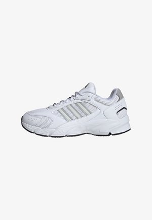 White athletic shoes with mesh and synthetic materials, featuring three silver stripes, a cushioned sole, and a padded collar for support.