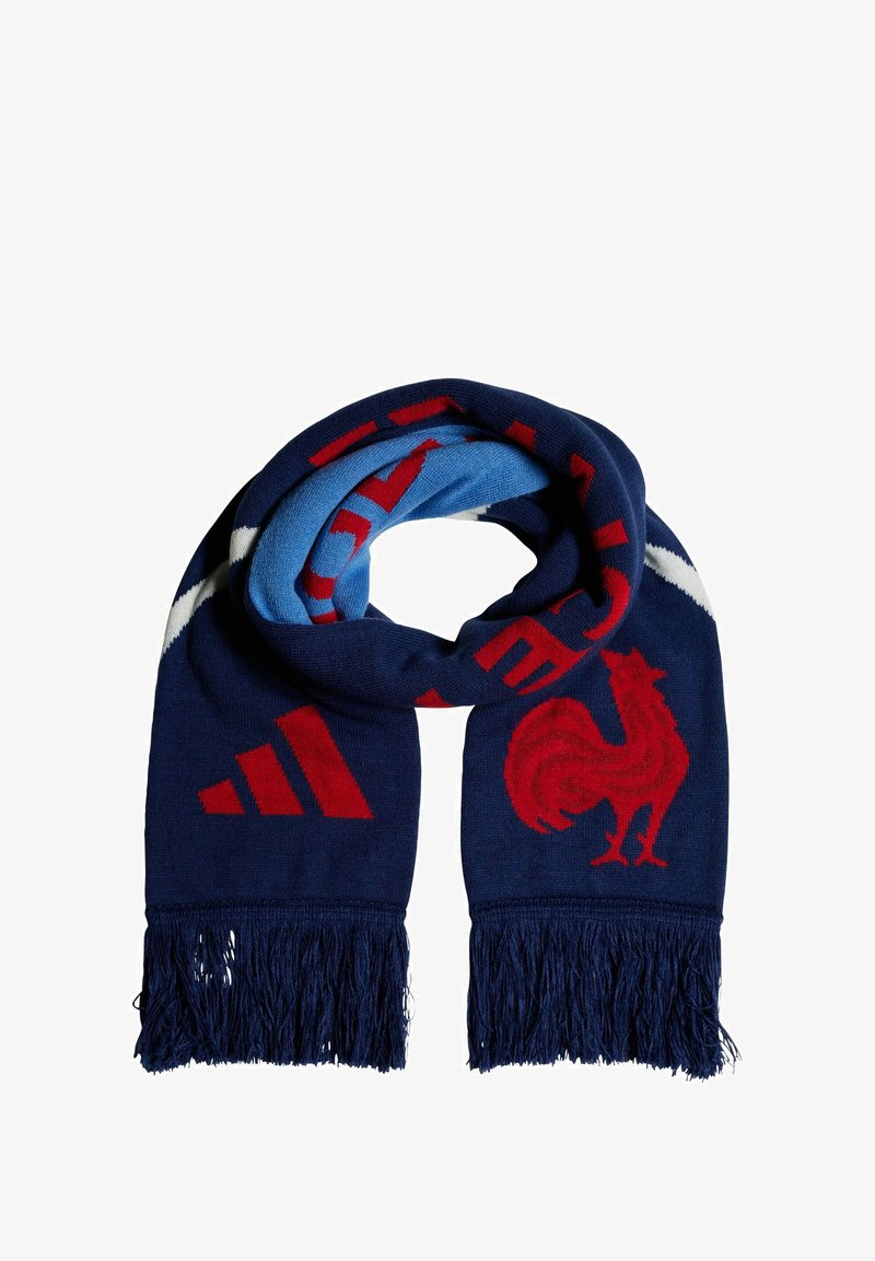 Écharpe bleu marine avec graphique de coq rouge, accents bleus et rayures blanches. Finition avec de longs franges sombres pour une texture ajoutée.