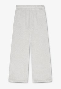 Svetlo šedé nohavice s širokými nohavicami vyrobené z jemného materiálu s elastickým pásom. Ploché švy a bez vreciek. Čistý, minimalistický dizajn.