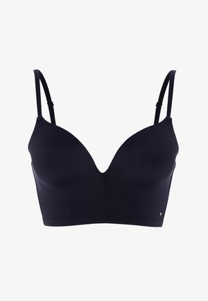 Reggiseno nero con design senza cuciture, tessuto leggero, scollatura a V profonda, spalline regolabili e logo discreto nella parte inferiore sinistra.