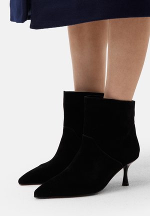 SUPERLUMINAL - Classic ankle boots - black
