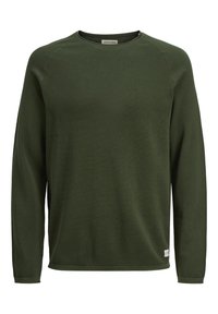 Grön långärmad tröja i texturerad tyg. Har en rund halsringning och ribbad nederkant, med en liten varumärkesetikett i nederkant till vänster.