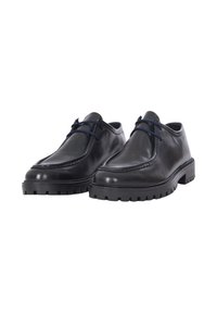 Scarpe in pelle nera con superficie liscia, suole spesse in gomma e punta arrotondata. Presentano dettagli blu nei lacci e cuciture decorative.