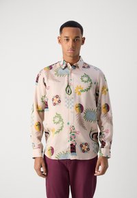 Light pink button-up shirt featuring an array of colorful patterns, including floral designs, geometric shapes, and nature motifs.