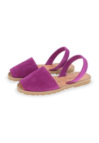 Purple suede slingback sandals with a wide toe strap, soft in texture, and a tan rubber sole featuring a patterned tread.