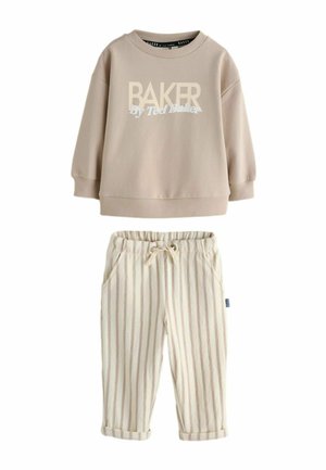 Beige long-sleeve sweatshirt with "BAKER By Ted Baker" text paired with cream pants featuring vertical beige stripes and a drawstring waist.