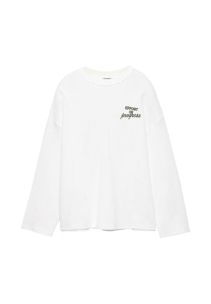 Weißes, langärmliges Rippshirt mit rundem Ausschnitt und dem in Schwarz gedruckten Text "EFFORT IN progress" auf der linken Brustseite.