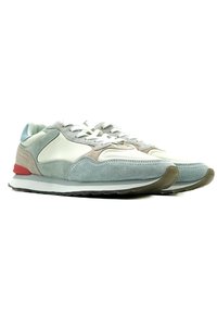 Light blue and gray suede sneakers with white leather accents, white laces, a textured sole, and a red heel tab.