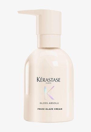 Kérastase Gloss Absolu Frizz-Glaze Crème in een beige pompflacon voor het gladmaken van het haar en de behandeling tegen pluizigheid.
