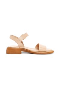 Sandal in pelle beige con tacco in legno piatto, dotata di due cinturini regolabili e un design minimalista con punta aperta.