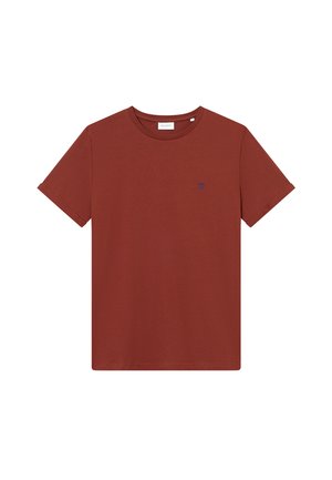 T-shirt in cotone color ruggine con collo rotondo e maniche corte. Presenta un piccolo logo blu sul petto. Design semplice e dal taglio rilassato.