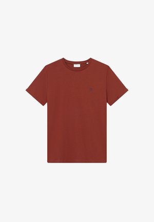 Roestkleurig katoenen T-shirt met een ronde hals en korte mouwen. Heeft een klein blauw logo op de borst. Eenvoudig, ontspannen ontwerp.