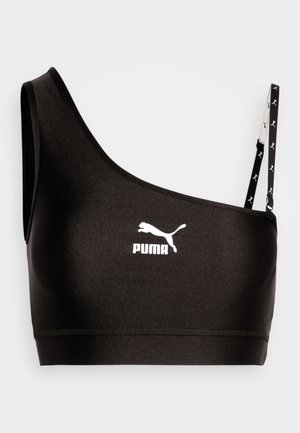 Čierny športový podprsenka s jedným ramienkom, s bielym logom Puma. Hladká, elastická tkanina s elegantným dizajnom a kontrastnými detailmi na ramienku.
