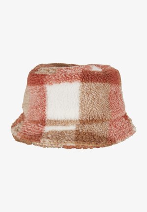 Plush bucket hat in a checkered pattern with shades of pastel pink, beige, and white. Textured fabric with a soft, fuzzy finish.