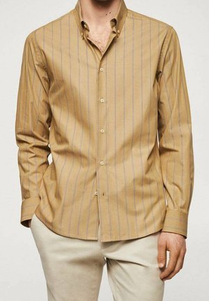 Tan long-sleeve shirt with vertical blue stripes, button-down collar, and front buttons. Made from smooth fabric with a fitted design.