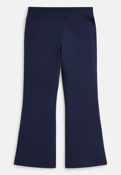 Tengerészkék, bővülő szárú leggings magas derékpánttal, rugalmas anyagból készült, sima varratokkal az oldala mentén és az alján.