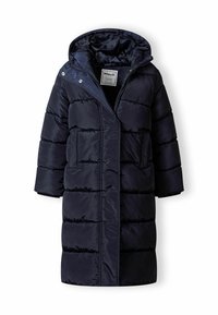 Námornícky pufovaný kabát s kapucňou, s bočným zapínaním, dvoma prednými vreckami a horizontálnym prešívaním. Vyrobené z lesklého materiálu.