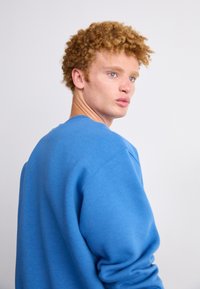 New Balance SPORT ESSENTIALS CREW UNISEX - Camisola - blue agate