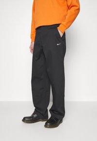 Nike Sportswear Tygbyxor - black