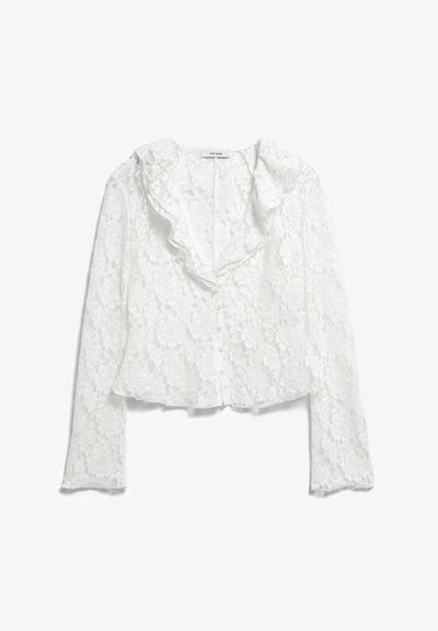 Λευκό μπλούζα από δαντέλα με μακριά μανίκια και λουλουδένιο μοτίβο, με γιακά με βολάν, κουμπιά στο εμπρός μέρος και ελαφρώς φαρδύ τελείωμα.