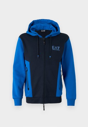 Felpa con cappuccio e zip in blu navy e blu, con tasche laterali, lacci e logo ricamato sul petto. Tessuto in misto cotone.