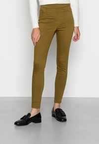 Marks & Spencer JEGGINGS - Calças de ganga de corte skinny - chartreuse