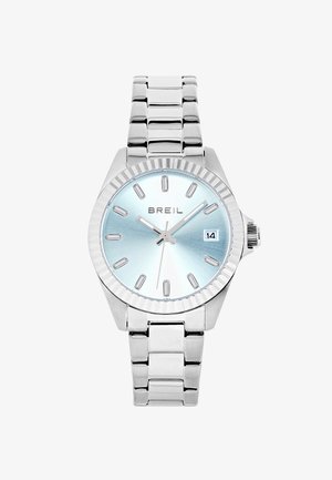 Montre en acier inoxydable argenté avec un cadran dégradé bleu clair, des index horaires rectangulaires, un affichage de la date et une lunette texturée.