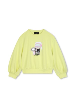 Lysegul langærmet sweatshirt med tegneseriefigurer iført skibriller og vintertøj trykt på forsiden.