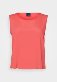 Coral sleeveless top with a round neckline, made of lightweight fabric. Smooth texture, loose fit, and a simple design.