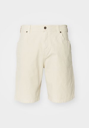 Beige cotton shorts with a straight cut, featuring a zipper fly, front pockets, and stitched hem. Smooth texture and minimalistic design.