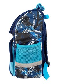 Backpack in navy and light blue with a graphic design featuring splashes and the word "ASSEMBLE." Includes a mesh pocket and zipper closures.