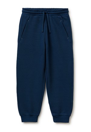 Granatowe spodnie dresowe z elastycznym pasem i sznurkiem do regulacji, kieszeniami po bokach oraz ściągaczami przy kostkach.