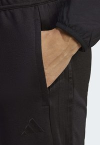 adidas Performance TIRO23 LEAGUE PANT W - Tepláky - black