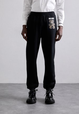 TEDDY BEAR - Tracksuit bottoms - multi black