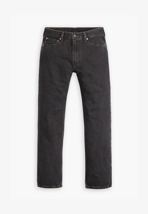 Μαύρα τζιν καμπάνα με πέντε τσέπες, κλείσιμο με κουμπί και χάλκινες τρυπανιές, τοποθετημένα επίπεδα σε λευκό φόντο.