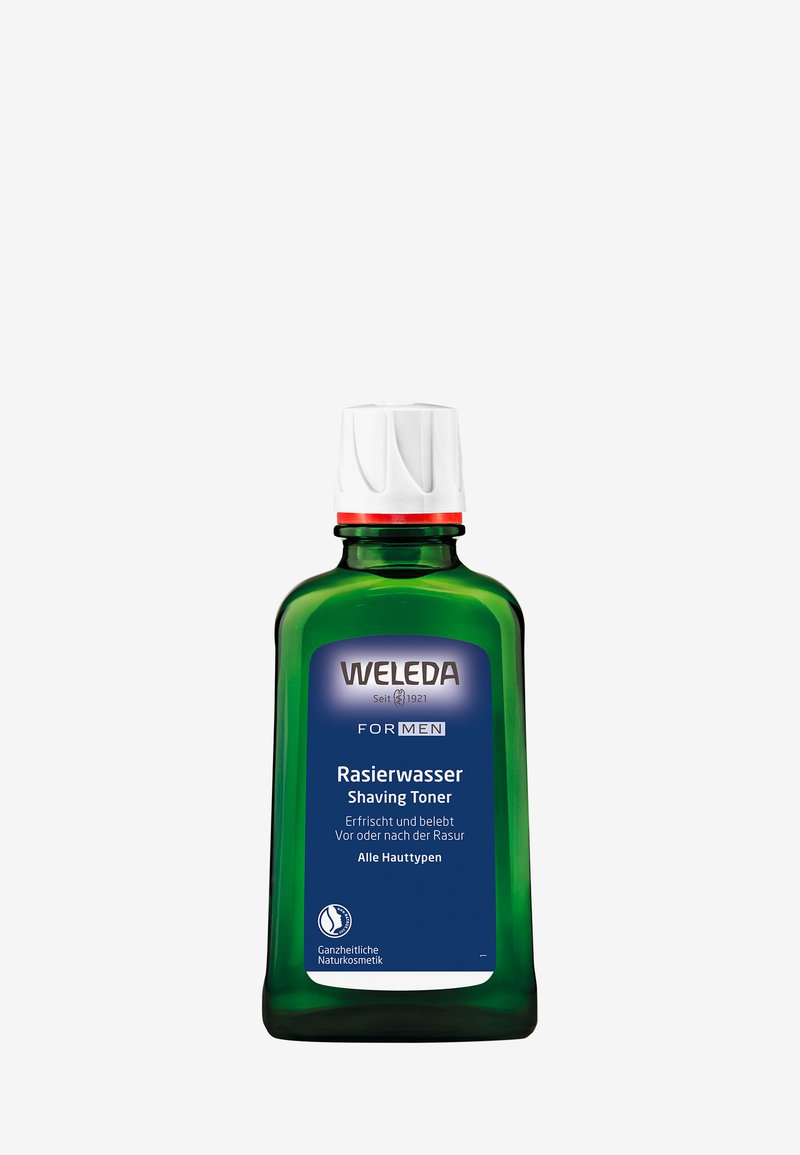 Toner de rasage Weleda dans une bouteille en verre verte avec un capuchon blanc. Présente une étiquette bleue avec du texte en allemand et en anglais. Taille de 150 ml.