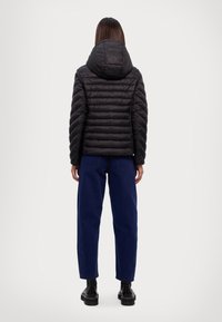 MICHAEL Michael Kors REVERSIBLE LOGO PACKABLE - Lengva striukė - black