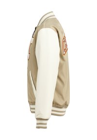 Kerman takki beige värviga, valgete varrukatega, oranži tikandiga kiri, ribaga triibuline krae, mansetid ja äär; küljetaskud on olemas.