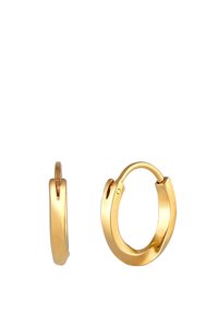 Boucles d'oreilles en or en forme de cercle avec une finition lisse et polie. Présentent une forme ronde classique avec une fermeture à charnière sécurisée pour un port facile.