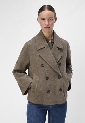 Brown wool blend double-breasted jacket with large notched collar, prominent black buttons, and side pockets. Casual fit, flared sleeves.
