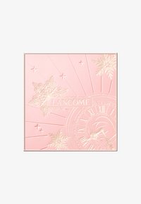 Boîtier compact rose avec flocons de neige embossés, motifs radiaux et design d'horloge. Présente des accents dorés et le logo "Lancôme" au centre.