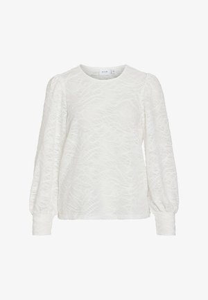 Fehér, hosszú ujjas felső, amely texturált anyagból készült, hullámos mintával, kerek nyakkivágással és puffos ujjal, amelyek fitted mandzsettába végződnek.