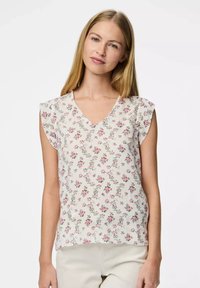 Blusa con stampa floreale caratterizzata da scollatura a V e maniche a volant. I colori includono crema, rosa e verde, con una texture di tessuto leggero.