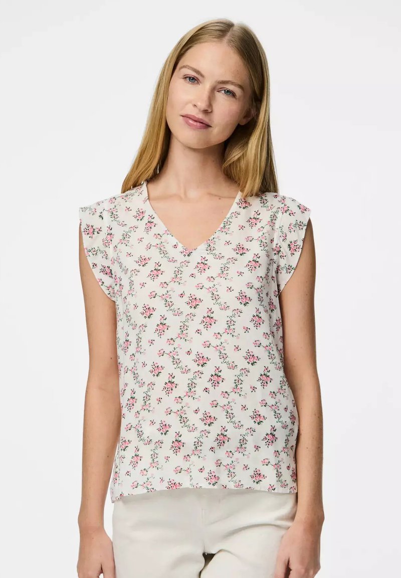 Blusa con stampa floreale caratterizzata da scollatura a V e maniche a volant. I colori includono crema, rosa e verde, con una texture di tessuto leggero.