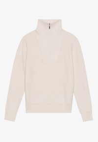 Hosszú ujjú garbós pulóver világos bézs bordás anyagból, félig cipzárral a nyaknál és dobozos fazonnal.